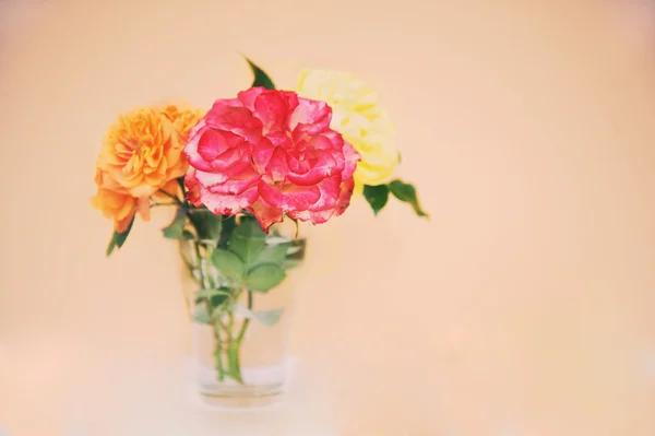 stock image Textured photo of garden roses in a glass