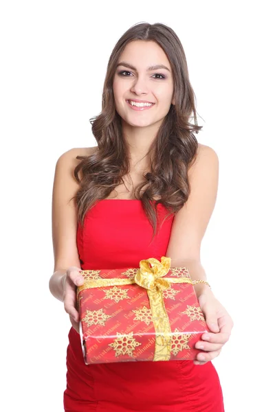 Women smiling with a gift in her hand — Stock Photo, Image
