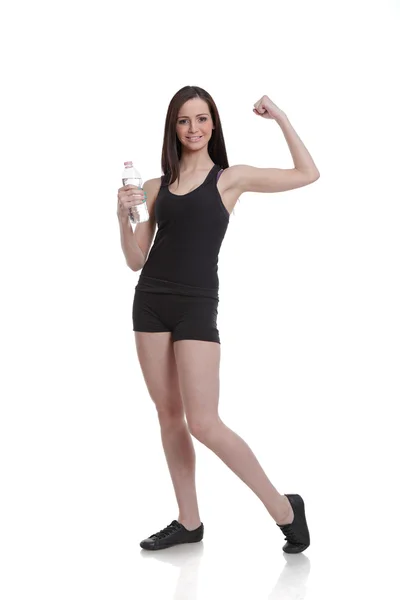 Cute vrouwen trainer tonen haar spieren — Stockfoto