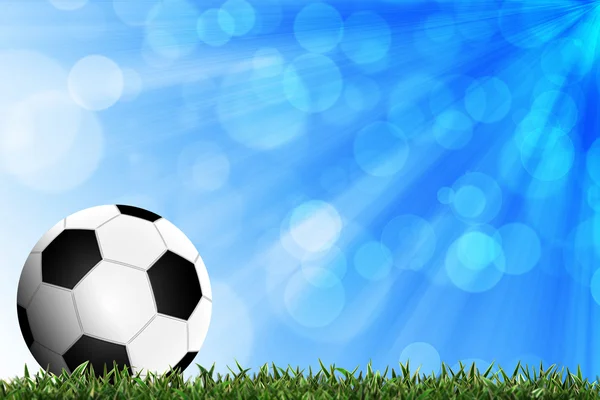 Fotboll i gröngräset med bakgrund färgglada — Stockfoto