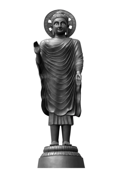 Standbeeld van Boeddha en een lotusbloem — Stockfoto