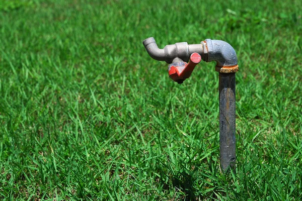 Faucet on yard — Stock Photo, Image