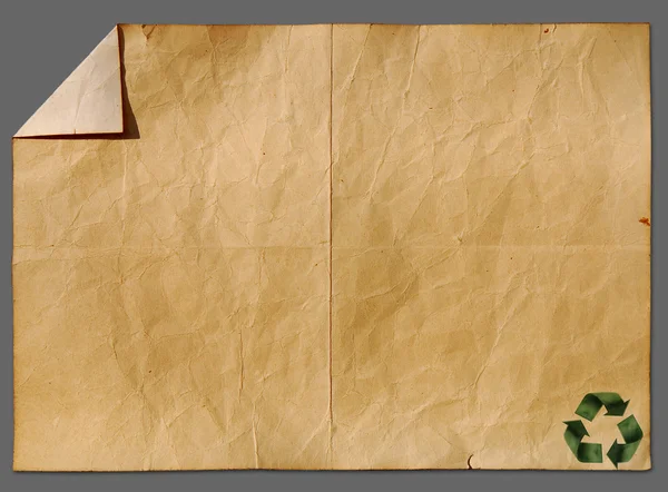 Recycled paper craft stick on old paper — Stock Photo, Image