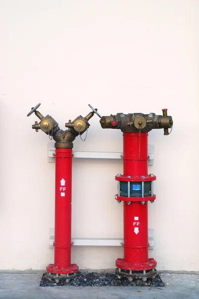 Hydrant with water hoses and fire extinguish equipmentHydrant wi — Stock Photo, Image