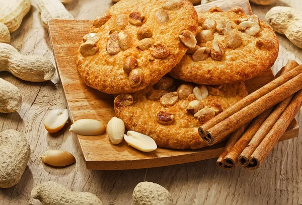 stock image Cookies with peanuts and cinnamon on the table