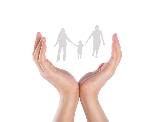 Hand with the paper cut of the family — Stock Photo, Image