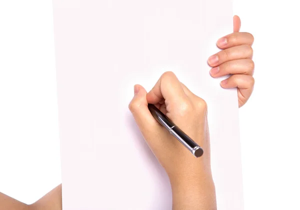 Mãos com caneta sobre papel isolado sobre fundo branco — Fotografia de Stock