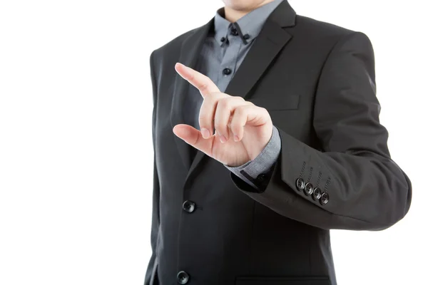 Ο άνθρωπος των επιχειρήσεων αγγίζοντας ένα φανταστικό οθόνης κατά λευκό φόντο — Φωτογραφία Αρχείου