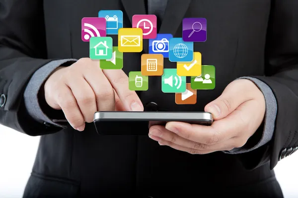 Homme d'affaires utilisent téléphone mobile avec des icônes d'application colorées — Photo