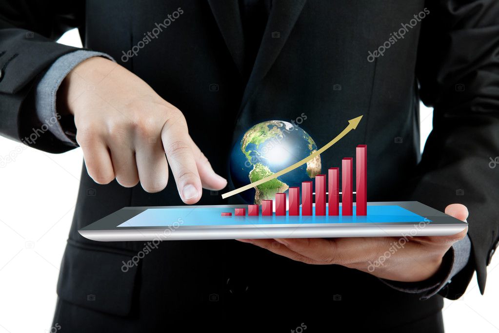 Business man holding the modern digital tablet pc with success g