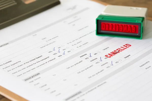 stock image Cancelled letter rubber stamp on application form