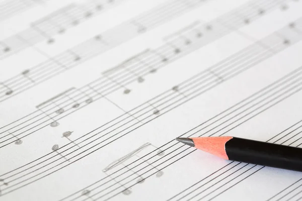 Lápis e folha de música — Fotografia de Stock