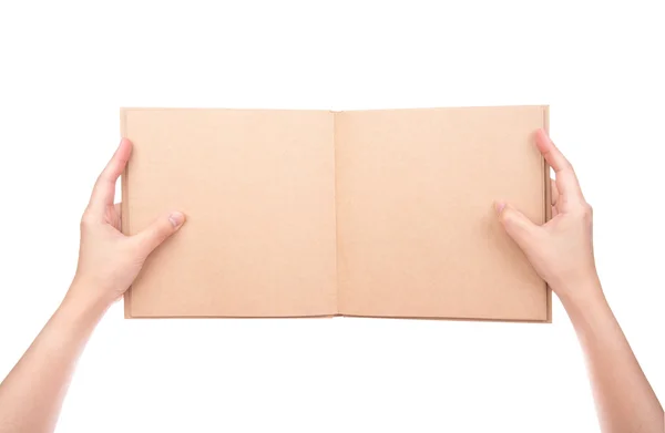 Kobiety ręki trzymającej rocznika książka na białym tle — Zdjęcie stockowe