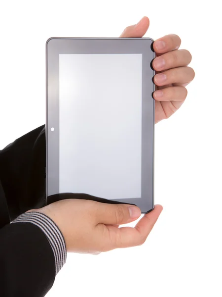 Homem de negócios usando um dispositivo de tela sensível ao toque contra backgroun branco — Fotografia de Stock