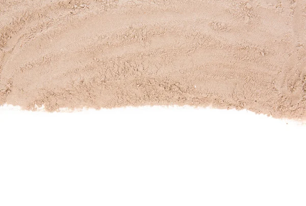 การกระจายทรายแยกกันบนพื้นหลังสีขาว — ภาพถ่ายสต็อก