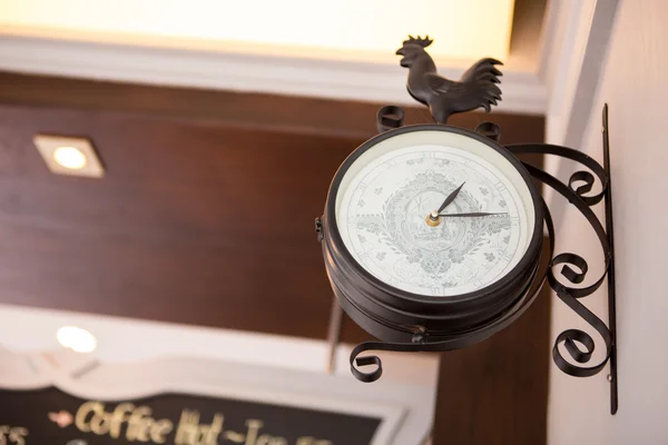 stock image Old style hanging clock