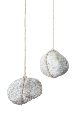 Stone, rock hanging by a string clipart