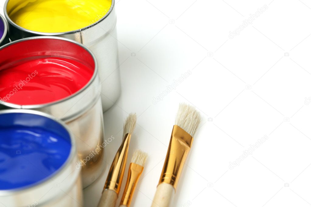 Cans of paint with paintbrushes