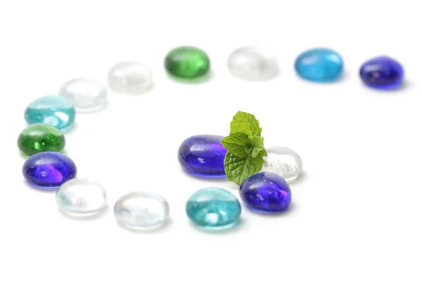 Leaf on colorful beads — Stock Photo, Image