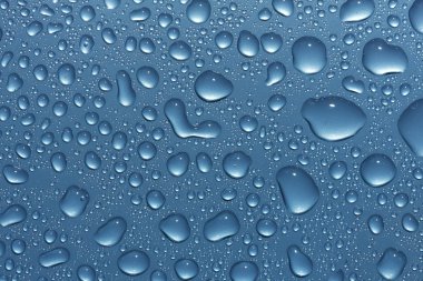 Water drops on metallic blue clipart