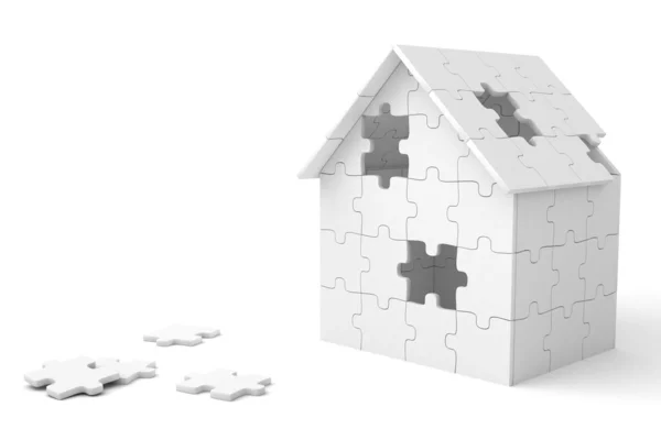 Haus aus Puzzleteilen gebaut — Stockfoto