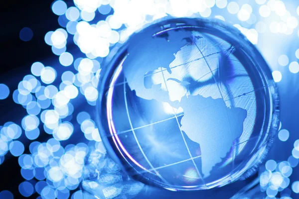 Glass globe in lights — Stock Photo, Image