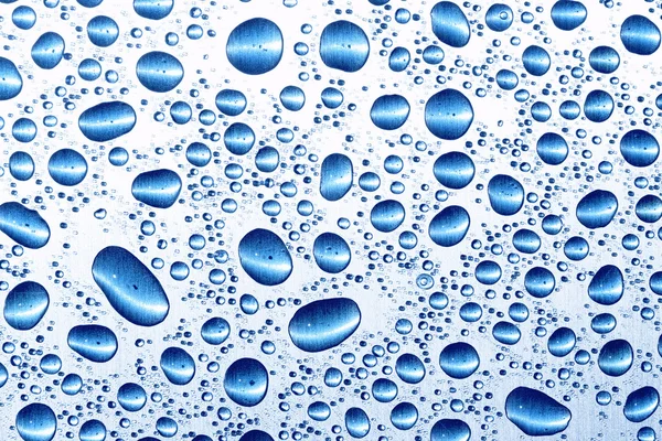Water druppels op metalen oppervlak — Stockfoto