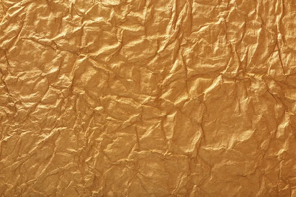 Crumpled gold paper — Stock Photo, Image