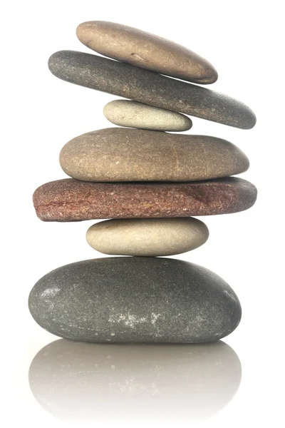 Stacked stones isolated on white — Stok fotoğraf