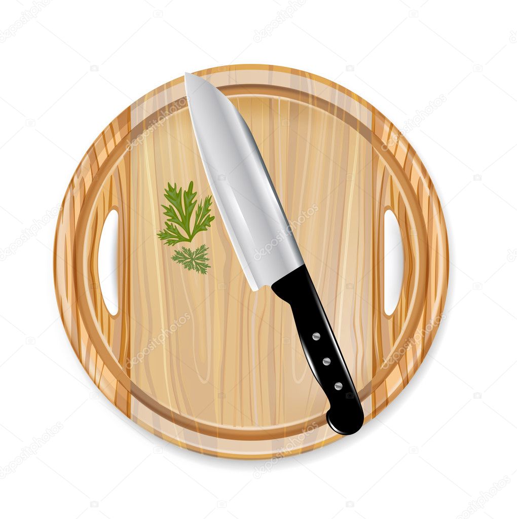 Wooden board with knife and parsley