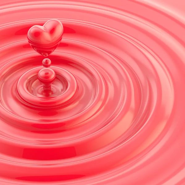 Liquido lucido a forma di cuore goccia — Foto Stock