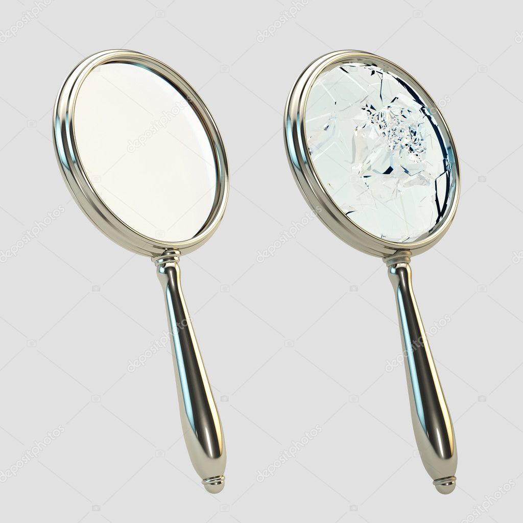 Magnifying broken glass isolated on gray