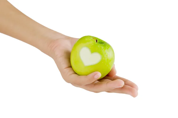 Äpple på hand — Stockfoto