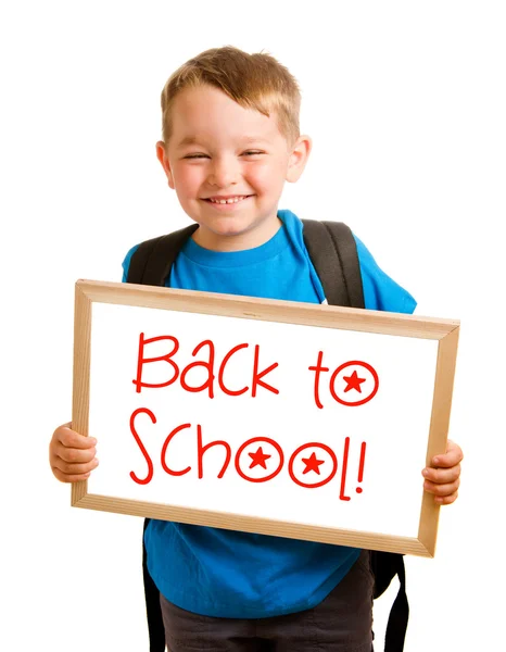 Conceito de educação com criança segurando sinal que diz "de volta à escola " — Fotografia de Stock