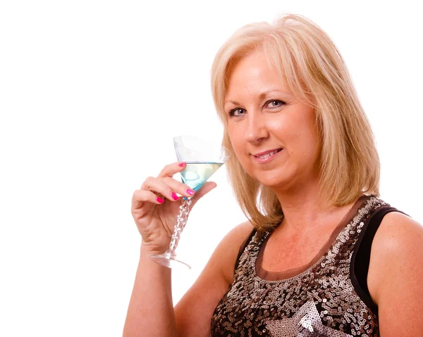 Portrait of pretty middle-aged woman in her 40s with cocktail and dressed for party or night out on the town — Stock Photo, Image