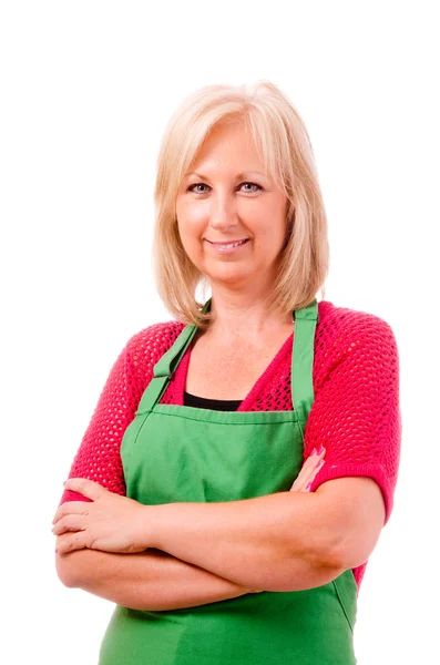 Portrait of smiling happy florist with green apron isolated on white — Stock Photo, Image