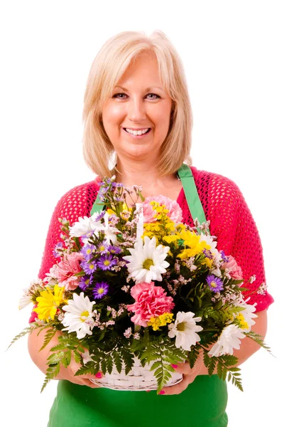 Portret uśmiechający się zadowolony kwiaciarni z zielony fartuch na białym tle — Zdjęcie stockowe