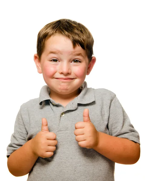 Retrato de criança confiante mostrando polegares isolados um branco — Fotografia de Stock