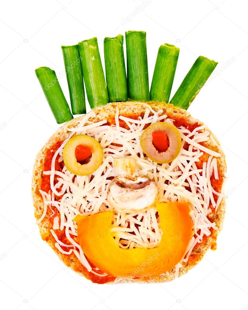 Healthy children's snack pizza with pasta sauce, cheese and vegetables on an English muffin in the shape of a smiley face