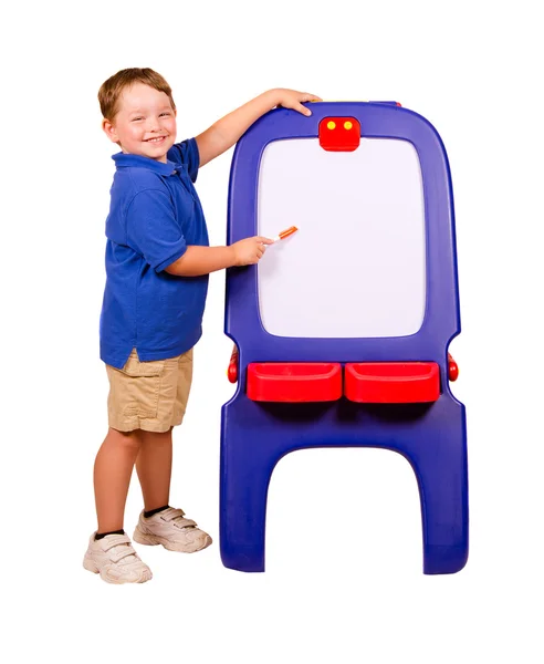 Child pointing at dry erase board with room for your text — Stock Photo, Image