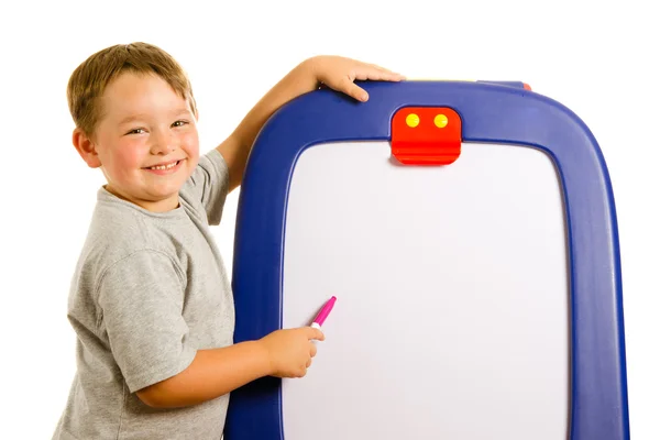Child pointing at dry erase board with room for your text Stock Photo