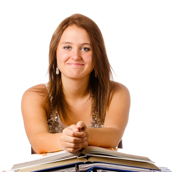 Glücklich lächelndes Teenager-Mädchen, das mit Büchern auf Weiß studiert — Stockfoto