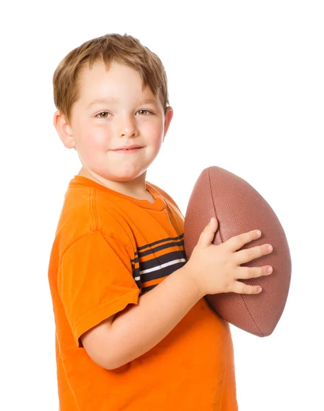 Child playing with American football isolated on white — Stock Photo, Image