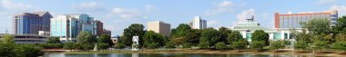 Panoramic cityscape of downtown Huntsville, Alabama from Big Spring Park clipart