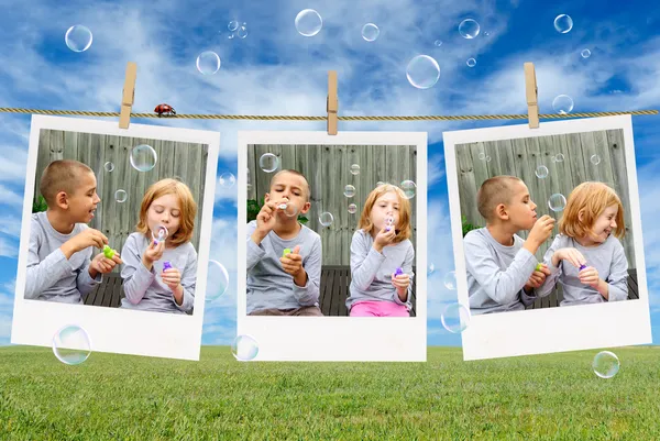 Brother and sister blowing soap bubbles — Stock Photo, Image
