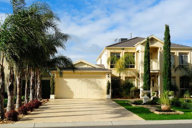 Modern two-story family house with garage clipart