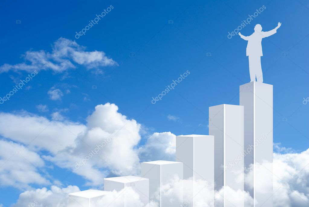 Business man standing on top of a graph bars