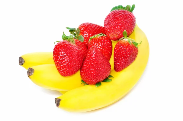 Bananer och jordgubbar Stockfoto