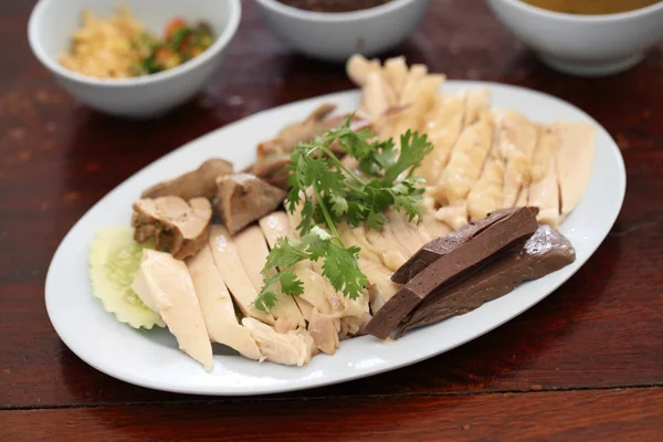 stock image Thai food gourmet steamed chicken , khao mun kai in wood backgr