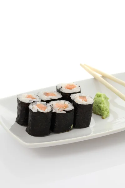 stock image Salmon Maki sushi with chopsticks